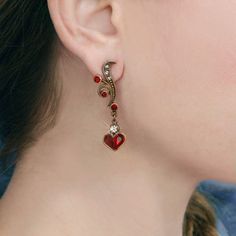 "These sweet earrings feature a graceful contoured link, embellished with a wave of smoke and garnet red Swarovski crystal. From the wave link dangles a heart formed of pear shaped crystals. Post style for pierced ears only. Bronze metal finish. Size: 1.75\" long. Made in our Los Angeles, CA studio. Matching Necklace: https://www.etsy.com/listing/676522813 Coordinating Bracelet: https://www.etsy.com/listing/591113695 Contact us for bulk pricing and wholesale information." Red Earrings Dangle, Victorian Earrings, Red Heart Earrings, Sweet Earrings, Love Earrings, Jewelry Cleaning Solution, Earrings Heart, Earrings Red, Red Earrings