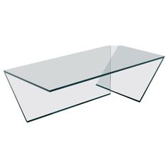 two glass tables sitting side by side on top of each other in front of a white background