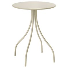 a white table with metal legs and a round top on an isolated white background, viewed from the front