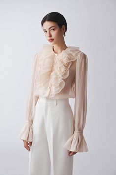 The shirt is the epitome of sophistication and elegance. Crafted from high-quality polyester, each shirt boasts a straight silhouette and poet sleeves for a luxurious touch. Perfect for any occasion, this blouse is a must-have for the fashion-forward individual looking to make a statement. Interesting Blouses, Poet Sleeve, Vintage Print Dress, Poet Blouse, Polyester Blouse, Mean Blvd, Polka Dot Blouse, Straight Cut, Western Wear