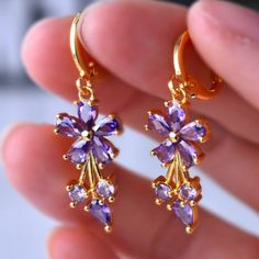 Nwt Gorgeous Pierced Earrings With Purple Stones. Elegant Purple Clip-on Earrings, Elegant Purple Flower Earrings, Elegant Purple Flower Shaped Earrings, Purple Flower Earrings For Party With Ear Wire, Purple Clip-on Jewelry As A Gift, Purple Clip-on Jewelry For Gift, Purple Clip-on Jewelry For Gifts, Purple Clip-on Jewelry As Gift, Purple Clip-on Jewelry Gift