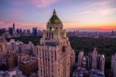 an aerial view of the empire building in new york city, ny at sunset or dawn