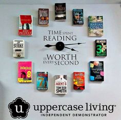 a clock made out of books with the words uppercase living on it's face