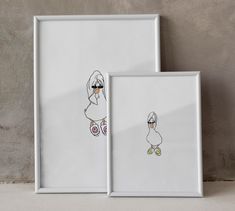 two framed pictures with cartoon characters on them