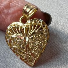 Beautiful Lace / Ornate Work Heart Pendant In Solid 14k Yellow Gold ( Stamped And Tested). The Pendant Is Approx 24 Mm Long ( Including Bail) By 16mm Wide ( At The Widest Point). Very Well Made, Bail Will Accommodate Variety Of Your Chains , Gorgeous Piece !!! Heart-shaped Yellow Jewelry For Weddings, Heart Shaped Yellow Jewelry For Wedding, Valentine's Day Gold Necklace With Intricate Design, Gold Heart Pendant With Intricate Design, Gold Intricate Design Heart Pendant Jewelry, Intricate Heart Pendant In Yellow Gold, Yellow Gold Heart Pendant With Intricate Design, Yellow Gold Heart Pendant Jewelry With Intricate Design, Heart-shaped Yellow Gold Jewelry With Intricate Design