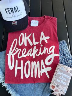 Score a touchdown with the Oklahoma Tee - perfect for any football fan! Representing the Oklahoma Sooners, this tee is a game day essential. Stay stylish and comfortable while cheering on your team. Boomer Sooner! professionally printed tee brand: next level color: crimson comfy, unisex fit made to order: ships in 10-14 business days. Thunder Outfit, Coaches Wife, Circuit Ideas, Boomer Sooner, Cowboys Football, Graphic Tee Dress, Oklahoma Sooners, Oklahoma State, Football Tees