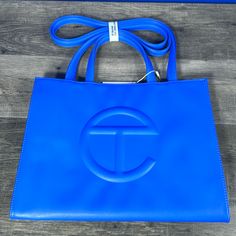 Brand New Telfar Medium Painters Tape Shopping Bag. Designer Blue Bag With Double Handle, Designer Blue Shopping Bags, Designer Blue Bag For Shopping, Designer Blue Bags For Shopping, Blue Shoulder Bag For Shopping With Dust Bag, Designer Blue Shoulder Bag For Shopping, Telfar Bags, Painters Tape, Shopping Tote