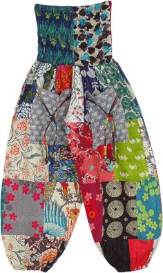 A kids' multicolored harem-style patchwork pants in various fascinating prints' patchwork. These soft cotton pull-on pants feature a smocking elastic waist, two functional front pockets with wooden-bead-closing buttons and elastic bottom. #tlb #SplitSkirtsPants #Patchwork #bohemianfashion #Handmade #GirlsHippiePants Hippie Multicolor Harem Pants With Pockets, Multicolor Harem Pants With Elastic Waistband, Multicolor Harem Pants With Pockets, Multicolor Floral Patchwork Bottoms For Summer, Multicolor Harem Pants For Spring, Multicolor Hippie Harem Pants For Spring, Multicolor Baggy Harem Pants Hippie Style, Hippie Multicolor Harem Pants For Spring, Spring Harem Bottoms With Patchwork