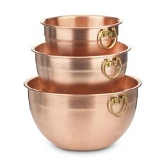 three metal bowls stacked on top of each other