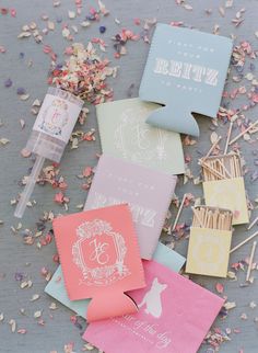 wedding favors and confetti on a table