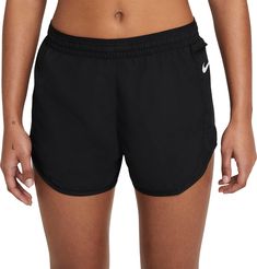 Fit & Design: Athletic fit running shorts Side slits provide added breathability Zippered side pocket is large enough to hold your phone Internal drop-in pocket can stash a card or key Nike® Swoosh logo on left side Elastic waistband with internal drawcord for a custom fit Technology: Nike® Flex fabric stretches with your body Dri-FIT® technology moves moisture away from the skin to keep you dry and comfortable Additional Details: Inseam: 3” Not intended for use as Personal Protective Equipm White Nike Pros, Grey Nike Shorts, Teal Nikes, Black Nike Shorts, Nike Pro Spandex, Nike Tempo, Workout Stuff, Womens Black Shorts, Nike Swoosh Logo