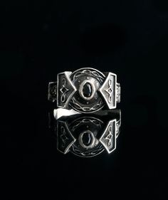 This Mjolnir Ring is not just a piece of jewelry, but a powerful amulet. Made from silver, it has unique properties that allow it to store information about the inner world of its owner. Silver can remove and redistribute negative energy, making it perfect for Healing Jewelry and for cleansing the human aura. This metal is also an excellent water purifier and antiseptic. In addition to silver, the ring features black obsidian. Obsidian is molten rock, volcanic glass, and it has several powerful Nordic Rings, Viking Style Adjustable Jewelry Ring, Viking Style Adjustable Engraved Rings, Adjustable Viking Style Ring Jewelry, Black Viking Engraved Jewelry, Handmade Viking Style Ring Jewelry, Viking Style Engraved Adjustable Rings, Human Aura, Handmade Viking Style Stainless Steel Jewelry