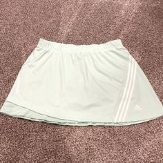 Adidas Tennis Skirt (Skorts), Mint Green & White, Like New! Size: No Size Tag But Measurements Indicate Size Large/Xl Measurements: -Waist: 16” -Length: 15” Excellent Preowned Condition, Never Worn, Flawless! Questions? Leave A Comment Below! Bin X Sporty Green Mini Skirt For Spring, Adidas Green Bottoms For Spring, Adidas Green Bottoms For Summer, Adidas Fitted Skirt For Spring, Adidas Casual Skort For Spring, Casual Adidas Skort For Spring, Casual Adidas Mini Skirt, Adidas Casual Spring Skort, Adidas Fitted Casual Skirt