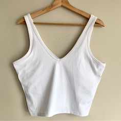 Gapfit Tank Top White Nwt Size L Gap Fitted Casual Tank Top, Gap Casual Fitted Tank Top, Fitted Casual Crop Top By Gap, Casual Fitted Gap Tank Top, Fitted Gap Crop Top For Summer, Gap Casual Cotton Crop Top, Casual Cotton Crop Top By Gap, Gap Basic Summer Tops, Sporty Gap Tops For Spring