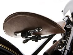 a close up view of the handlebars and saddlebags on a motorbike