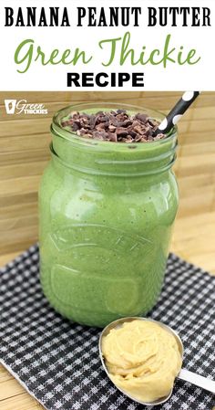 banana peanut butter green thickie recipe in a mason jar with spoon on the side