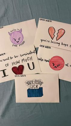 four handmade cards with different types of emoticions and words written on them