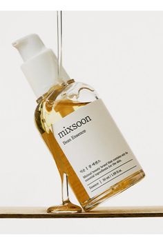 Discover the transformative power of First Mixsoon Bean Essence! 🌟 This Korean 2-in-1 essence is perfect for textured skin, gently exfoliating to clear pores and dead skin while moisturizing and restoring collagen for a radiant complexion. Formulated with fermented ingredients like bean, barley, pomegranate, and Korean pear, it's safe, vegan, and cruelty-free. Elevate your skincare routine today! ✨ #Skincare #KBeauty #TextureSolution Packaging Photoshoot, Korean Pear, Insta Posts Ideas, Serum Texture, Textured Skin, Natural Luxury, Face Oils, Clear Pores, Content Design