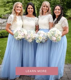 three bridesmaids pose for a photo with their bouquets in front of them