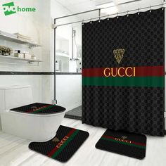 the bathroom is decorated in black and red with gucci shower curtain, toilet seat cover and rugs