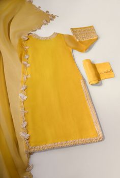 Elegant Yellow Churidar With Sheer Dupatta, Elegant Yellow Churidar With Gota Work, Party Wear Dupatta With Pearl Embroidery For Diwali, Eid Party Wear Organza Churidar, Elegant Yellow Churidar With Chikankari Embroidery, Party Wear Dupatta With Pearl Embroidery For Eid, Party Wear Organza Sharara With Pearl Embroidery, Silk Party Wear Sets With Pearl Embroidery, Silk Sets With Pearl Embroidery For Party Wear