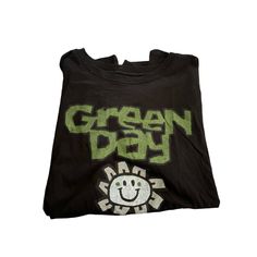 You Are Purchasing: Torrid Green Day Classic Fit Smiley Potted Flower T-Shirt 1x 60% Cotton 40% Poly Short Sleeve Pit To Pit 24" Length 26" Size: Womens 1x Condition: New With Tags Green Day Band Shirt, Green Day Merch, Greenday Shirt, Green Day T Shirt, Green Day Shirt, Green Day Band, Lace Short Sleeve Top, Orange Blouse, White Halter Maxi Dress