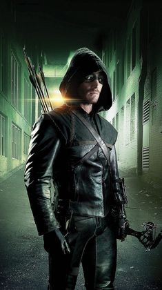 the arrow man is standing in an alley way