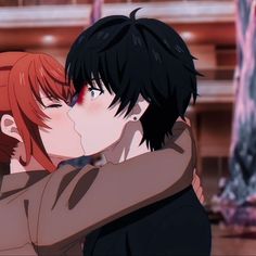 two people kissing each other in an anime