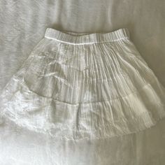 Flowy White Linen Skirt Perfect For The Summer Size: Small No Tags But Never Worn. Selling Because I Have No Need For It White Flowy Pleated Skirt For Daywear, White Flared Skirt Bottoms For Summer, Summer White Flared Skirt, White Flared Skirt For Summer, White Pleated Bottoms For Vacation, White Lined Pleated Skirt For Daywear, White Casual Skort With Full Skirt, Short Relaxed Lined Skirt, Summer Daywear Pleated Skirt With Lining