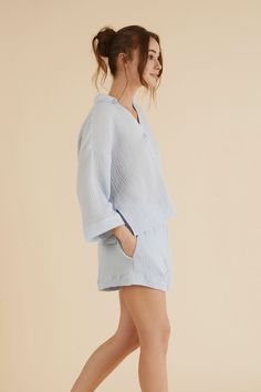 Effortless Echo Boy Short Baby Blue is an ideal style for brunch dates or a coffee break. Designed with a breeze from 70’s, will be a timeless piece in your wardrobe that withstands trends for supporting slow fashion. Made with sustainability in mind, this short features breathable fibers. This high elastic waisted short is slightly oversized with side pockets, allowing you to move freely throughout the day. - 100% Turkish cotton- Side pockets Comfortable Blue Sleepwear For Spring, Spring Solid Color Relaxed Fit Sleepwear, Solid Spring Sleepwear With Relaxed Fit, Blue Collared Relaxed Fit Sleepwear, Light Blue Relaxed Fit Sleepwear For Summer, Relaxed Blue Tops For Daywear, Comfortable Summer Tops For Daywear, Effortless Blue Tops For Spring, Chic Blue Sleepwear For Loungewear