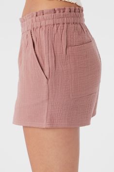 Effortlessly stylish woven pull-on short that features a solid color design, front slash pockets and paperbag waistband detail. O'Neill Women's woven short 2" Inseam 10 1/4" Front rise Elastic paperbag waistband Slash pockets Solid color wash 100% Cotton crinkle double gauze | O'Neill Women's Carla Crinkle Double Gauze Beach Shorts in Burlwood, Size 2XL Pull On Shorts, Woman Weaving, Double Gauze, Burled Wood, Beach Shorts, Dressmaking, Tunics, Color Design, Paper Bag