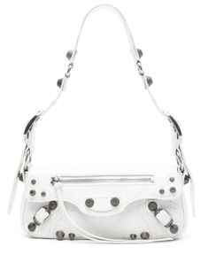 optical white lambskin crease effect rectangle body adjustable shoulder strap silver-tone stud detailing decorative zip detailing decorative buckle detailing rear zip-fastening pocket main compartment internal logo patch full lining silver-tone hardware foldover top with magnetic fastening This piece comes complete with a protective dust bag. We've partnered with Good On You — an independent agency that rates how brands perform in relation to their impact on the planet, people and animals, with a multi-criteria rating simplified to a five points scale. In order to be awarded our conscious label, larger brands need to score a minimum of four out of five ('Good'), while smaller brands must score at least three out of five ('It's a start'). This item comes from a brand rated four out of five Planet People, White Bag, Sling Bag, Patch Logo, White Color, Leather Shoulder Bag, Balenciaga, Dust Bag, Silver Tone