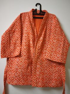 "Winter Short Kimono, New Printed Kantha Winter Short Robe, Cotton Kantha Jacket Kimono, Short Kimono for Christmas gift, Women Dressing Gown Item details Handmade Kantha Stitched Ladies Winter Short Kimono Material:- Cotton Printed Color : As Per Photos Size:-One size (plus) US women's letter NEW PRINT JACKET WITH 2 FRONT POCKET STYLE .. Winter Short Kimono Jacket made with NEW kantha quilt fabric which is fresh and new. This kantha fabric is hand stitched and it is the specialty of this piece. Red Cotton Long Sleeve Robe, Long Sleeve Red Cotton Robe, Red Long Sleeve Cotton Robe, Orange Cotton Long Sleeve Kurta, Long Sleeve Orange Cotton Kurta, Vintage Long Sleeve Kimono For Festive Occasions, Traditional Long Sleeve Orange Outerwear, Traditional Orange Long Sleeve Outerwear, Traditional Long Sleeve Printed Kimono