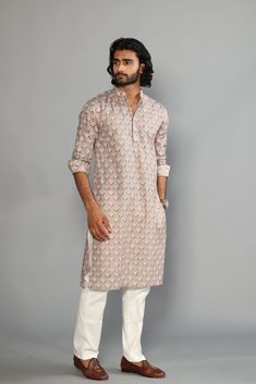 This is a bespoke product, specially crafted for you.  Crafted in Chinese Collar and Full Sleeves Available with a Cotton Pajama in White, It has a hand-block printed design all over it which makes it best outfit for your Wedding Function, Diwali, Eid, Durga Pooja and Cocktail Parties. Do note: Footwear shown in the image are also made to order and can be added separately, but it takes 15 days processing time.  (Slight variation in actual color vs. image is possible) Cotton Block Print Wedding Sets, Wedding Cotton Sets With Block Print, Wedding Cotton Block Print Sets, Wedding Straight Kurta With Block Print, Bollywood Style Wedding Kurta With Printed Motifs, Wedding Sherwani With Printed Motifs, Wedding Kurta With Block Print For Transitional Season, Cotton Kurta With Block Print For Wedding, Cotton Block Print Kurta For Wedding