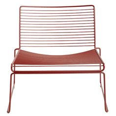 a red chair with metal slats on it