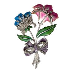 This is part of Chairish’s Costume Jewelry assortment.  A wonderful Art Deco period brooch in sterling silver. The bouquet consists of a pink and blue enamel flower decorated with marcasite. There are two green leaves, and it is tied with a lavender enamel bow. The piece is marked sterling on the back and is in excellent condition.   Dimensions: Length: 2 7/8", Width: 2", Weight: 29.9 grams Silver Enamel Pin For Wedding, Silver Enamel Wedding Pin, 1920s Art, 1920s Art Deco, Art Deco Period, Enamel Flower, Floral Bouquets, Flower Decorations, Green Leaves