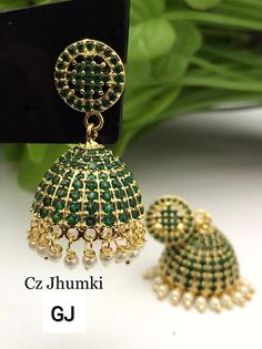 Material : Brass , CZ stones. Multi colour diamond jhumkas of exclusive quality. No no element used of germen silver. Most eligible gift for someone you love and someone very special for you. Best gift for your anniversary. Best gift for her Birthday. Earrings : 1 pair we now started to market our products online. Our online shop ensures you enjoy an easy, fast, convenient and secure shopping experience online. we are working daily to bring you more unique gemstones quality, shapes which you wan Green Jhumkas With Stone Work, Green Stone Work Jhumkas For Celebration, Festive Green Hand Set Earrings, Green Cubic Zirconia Earrings For Celebration, Festive Green Hand-set Earrings, Green Hand Set Round Chandbalis, Green Stone Work Temple Jewelry Earrings, Green Hand Set Fusion Jhumkas, Festive Cubic Zirconia Danglers As Gift