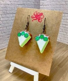 Each unique piece is handcrafted, so no two items are the same. Made from Polymer Clay and sealed to provide maximum durability.  Nickel Free.  If you like this piece but would like custom changes made to it, email me and I can let you know about prices! Pie Earrings, Reno Nv, Lime Pie, Key Lime Pie, Earring Holder, Key Lime, Cute Earrings, Cute Jewelry, Reno