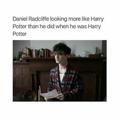 an image of a man reading a book in front of a fireplace with the caption'daniel radicfife looking more like harry potter than he did when he was harry potter