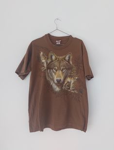 Vintage Woolf Hazelwoods T-Shirt,  Woolf T-Shirt, Size L Brown Tee Man Unisex 100% Cotton Size L but see measurements Measurements laying flat Chest 55cm / 21,65 in x2 Lenght 72cm / 28,35 in Condition used good Pre-shrunk Brown Crew Neck T-shirt, Brown Crew Neck Top, Brown Graphic Tee With Short Sleeves, Brown Pre-shrunk Graphic Tee T-shirt, Brown Pre-shrunk Graphic Tee, Brown Graphic Tee Shirt With Graphic Print, Brown Short Sleeve Tops With Screen Print, Brown Short Sleeve Top With Screen Print, Brown Crew Neck Graphic Tee