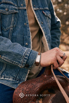 Wear something unexpected when you style the Maverick Leather Bracelet. A leather band with hammered Sterling Silver details, this bracelet effortlessly blends mixed materials into a cohesive design that’s both rugged and timeless. This bracelet is a part of Yellow Rose by Kendra Scott—a brand that celebrates ranch life with Kendra Scott staples alongside select curated jewelry pieces and accessories. Ranch Life, Hammered Sterling Silver, Oxidized Sterling Silver, Gorgeous Gift, Men's Accessories, Yellow Rose, Leather Band, Kendra Scott, Best Friend Gifts