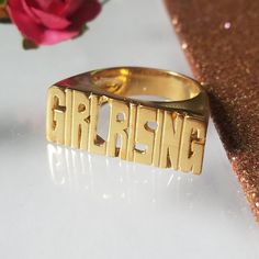 Modern Block letter name ring in 14k solid gold is a perfect statement ring for you or gift for your loved one, Best friend and so many other gift possibilities. Yes Modern block letter ring is Unisex. Sample of words: SEPARATE HANDS OR ONE FINGER 1.LOVE YOU. 2.PEACE LOVE 3.MEN NAME 3.YOUR NAME and many more....( contact me for more info) *COLOR* White gold 14k. Yellow gold 14k. Pink gold 14k. *SIZES* NAME 3/4'' to 1 '' depends on the name it is going to be adjusted accordingly by the ring size. Personalized Gold Rings For Valentine's Day, Gold Engraved Name Ring For Promise, Nameplate Engraved Ring For Gift, Custom Name Gold Promise Ring, 14k Gold Initial Ring For Promise With Custom Name, Custom Name 14k Gold Ring For Gift, Custom Name 14k Gold Ring As Gift, Custom Name 14k Gold Ring Gift, Promise Ring With Custom Name In 14k Gold