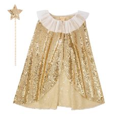 a gold sequin dress and star wand