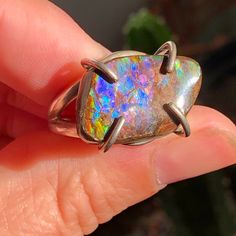 Ammolite Sterling Silver Ring Size 9. Ammolite Fossil cabochon has protective resin coating. Multicolor Oval Jewelry With Natural Inclusions, Artisan Cabochon Opal Ring Gift, Unique Multicolor Cabochon Opal Ring, Hematite Ring, Quartz Crystal Pendant, Resin Coating, Quartz Necklace, Amethyst Crystal, Crystal Pendant