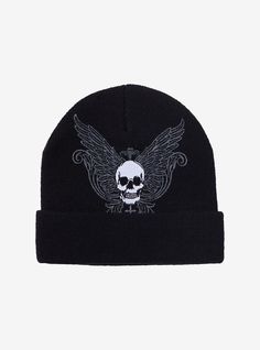 Add some Y2K biker flare to your beanie game with this black style printed with ornate wings and filigree and embroidered with a skull. Gothic Black Hat For Fall, Alternative Winter Hats For Streetwear, Alternative Winter Streetwear Hat, Black Skull Print Hat, Black Alternative Style Hats For Streetwear, Casual Black Hat With Skull Print, Black Skull Print Hat For Streetwear, Black Halloween Hat With Skull Print, Skull Beanie