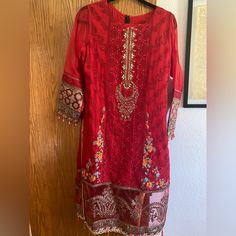 This Is A Design From Maria B. It’s A 3 Piece, Red Outfit That Comes With A Matching Dupatta And Red Trouser Pants. The Sleeves Are Long And With Beading Attached To The Ends. The Bust Size Is 36-38 Inches, Sleeves Are 20-21 Inches, Waist Is 30-32 Inches And Elastic And The Pant Length Will Fit Anyone Who Is 5’2-5’6”. Note: Any Defects Not Mentioned But Visible In The Pictures Will Be Considered As Described. All Items Have Been Stored In A Clean, Smoke-Free And Animal-Free Environment. Fitted Red Embellished Sets, Red Embellished Formal Sets, Red Hand Embellished Fitted Sets, Red Sequined Sets For Eid, Red Sequin Sets For Eid, Red Trousers, Maria B, Size 6 Dress, Red Outfit