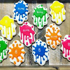 colorful decorated cookies with the words slime on them