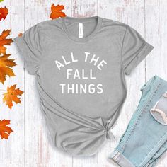 All The Fall Things in a modern font graphic on front in cream or multi Fall colors. Youth Sizes S-XL (unisex sizing) Toddler Sizes 2T, 3T, 4T To view All The Fall Things Adult T-shirts click here.To view All The Fall Things Baby Bodysuit click here.Bella + Canvas4.2 oz. Airlume combed and ring-spun cottonPre-shrunkFor a more relaxed fit, size up! Trendy Screen Print T-shirt For Fall, Everyday Fall Slogan T-shirt, Fall Graphic Print T-shirt, Fall Graphic Tee Soft-washed, Inspirational Letter Print T-shirt For Spring, Gray Slogan T-shirt For Spring, Fall Gray Graphic Print T-shirt, Gray Graphic Print T-shirt For Fall, Spring Gray T-shirt With Slogan