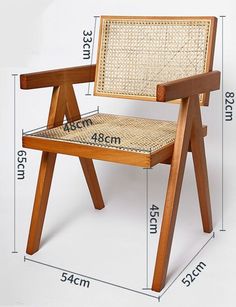 a wooden chair with woven seat and back, measurements for the seat height in front of it