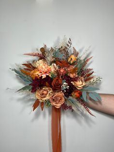 We are a Full Service Florist 💐 That means that we can make and customize anything!💕 Every single item in your order will be matched to the same style as the Bridal Bouquet on the photo, unless you ask otherwise.🥰 You can customize any item (size, color, flowers, accents) or we can make items that are not even listed For example you can request groom's boutonniere to stand out from the rest of them 🤗 We will be sending you photos of all the items for confirmation! Nothing gets shipped unless Wedding Bouquet Terracotta, Burnt Orange Bouquet, October Bouquet, Fall Eucalyptus, Orange Wedding Bouquet, Orange Bouquet, Grass Artificial, Orange Bouquets, Orange Wedding Flowers